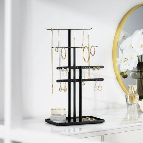 Black Jewelry Stand Organizer 14.5 Inch Tiered Display Tower with 3 tiers and 4 bars holding necklaces and earrings on dresser