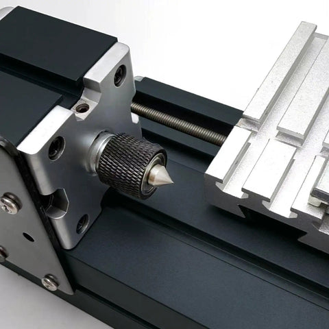 Close-up of the adjustable tailstock on the 60W Mini Bench Electric Lathe Machine 12000 RPM All Metal Woodworking Tool.