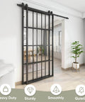 Bypass Double Glass Barn Door Kit With 84 By 84 In Clear Tempered Glass And 7.5 Ft Side Mounted Aluminum Black Frame installed indoors