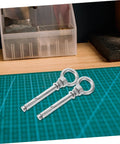 Heavy Duty Stainless Steel Eye Bolts Hanger Kit 5 Piece For Secure Lifting And Suspension on cutting mat
