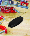 20 Pack ABS Plastic Enclosure Box in black on workbench with tools, ideal for electronics projects PCB housing.