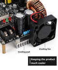 Close-up of DC Buck Converter 10 To 65V To 0 To 60V 0 To 12A Step Down Power Supply Module with LED Display and cooling fan.