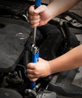 Ratchet Wrench Extender For Hard To Reach Spots used in car engine bay, showing universal offset extension bar and square drive adapters