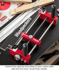 Zero Drama Small Parts Holder For Router Tables with heavy duty clamps and precision stop pins on a router table.