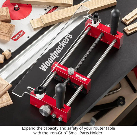 Zero Drama Small Parts Holder For Router Tables with heavy duty clamps and precision stop pins on a router table.