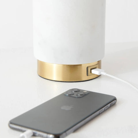 Arden LED Table Lamp With USB Port Charge Your Phone Or Tablet showing marble base with USB charging a phone