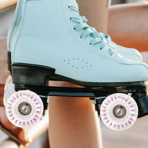 Blue quad roller skate with installed 2 Pack LED Light Up Roller Skate Replacement Wheels For Quad Skates Glow Wheels For Indoor And Outdoor Use Outdoor Recreational Skating Accessories Easy Swap Dope Skating Vibe.