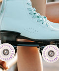 Light Up Roller Skate Wheels With Bearings For Quad And Inline Skates LED Indoor Outdoor Replacement Parts 2 Pack For Outdoor Fun And Indoor Rink Sessions Trendy Lighted Wheel Upgrade on blue skates.
