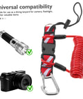 Coiled Diving Lanyard With Quick Release Buckle For Underwater Camera And Flashlight Securement, Red Scuba Webbing Strap, Steel Spring Tether Built For Durable Marine Dives And Fishing Adventures. Image shows lanyard with camera and flashlight compatibility.