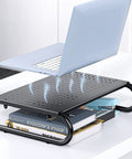 Desktop Monitor Stand With Dope Ventilated Perforated Steel Design, Desk Organizer And Laptop Shelf shown holding books and a laptop