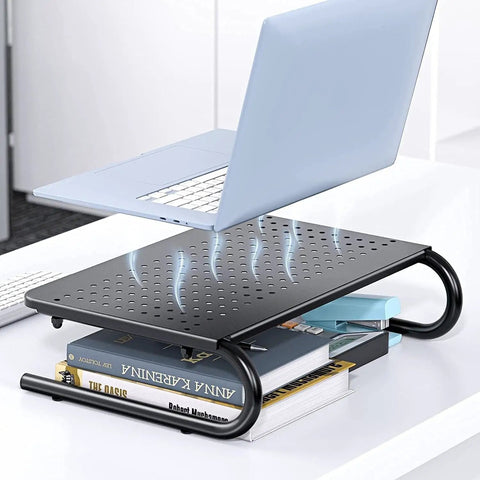 Desktop Monitor Stand With Dope Ventilated Perforated Steel Design, Desk Organizer And Laptop Shelf shown holding books and a laptop