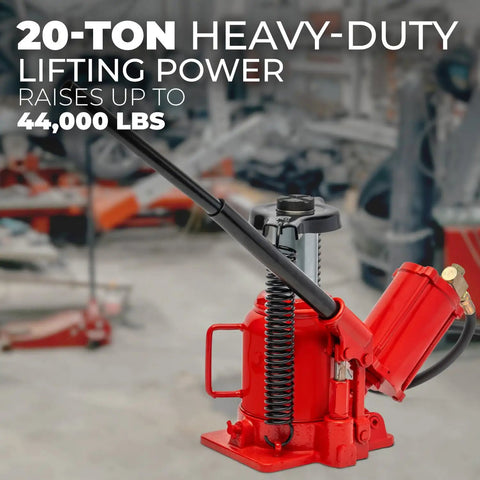 Beefy Twenty Ton Portable Hydraulic Bottle Jack With Air Operated Pneumatic Lift in a garage setting