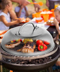 9 Inch Griddle Dome Cover For Smash Burgers And Melting Basting Shield covering food on outdoor grill