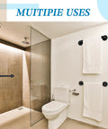 Tough As Nails 4 Pack Bathroom Grab Bars In Satin Black 20 Inch Long 304 Stainless Steel mounted in modern bathroom with towels.
