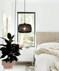 Black Woven Plug In Pendant Light With On Off Switch Rustic Round Ceiling Fixture Made From Natural Fibers Cozy Glow For Entryway Bedroom Kitchen Island Living Room Or Dining Area Dope Vibe hanging in a bedroom.