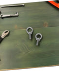 Heavy Duty Stainless Steel Eye Bolt M6x20 With Closed Ring For Machinery And Concrete Anchors, Weatherproof Marine Grade Eye Hardware For Outdoor And Wet Environments, High Strength Wall Anchor Bolt on green wood