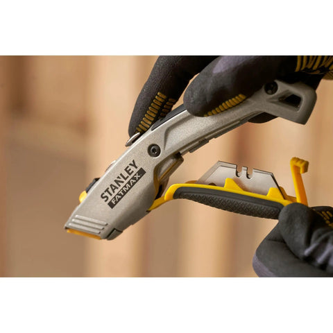 2 In 1 Snap Off Knife Xtreme with stainless steel blade guide, 9mm width, quick blade change via notched wheel, gray handle in use.