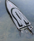 Top view of RTR 25.5 Inch Brushless Remote Control Boat With 2.4GHz Radio, 4WD Speed Watercraft That Hits Up To 30 MPH, Waterproof Hull