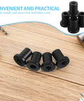 Black flat door spacers for barn door installation on wooden surface, surrounded by tools