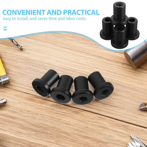 Black flat door spacers for barn door installation on wooden surface, surrounded by tools