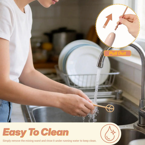 A person rinsing the Handheld Electric Baby Formula Mixer With 2 Stirring Sticks under a faucet, demonstrating easy cleaning.