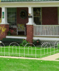 White Garden Fence Border 18 Inch High 50 Feet Long Foldable Metal Wire Panel Fencing installed in front yard