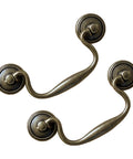 Vintage Bail Drawer Pull Set 4 Pack Antique Brass Cabinet Handles 3.75 Inch Center To Center For Dresser Cupboard Wardrobe And Kitchen Cabinets Classic Drop Design close-up view of brass handles