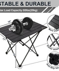 Foldable Aluminum Camping Table, Portable Side Desk with weight, compact, stable, black aluminum surface, 55lbs capacity, outdoor use.