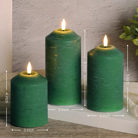 Green Christmas Flameless Pillar Candles With Remote Control Battery Powered Led Wax Candles Real Wax Look And Flicker Flames Cone Top Design With Lifelike Wicks 3 Pack For Cozy Holiday Vibes, shown in three different heights on a wooden shelf.