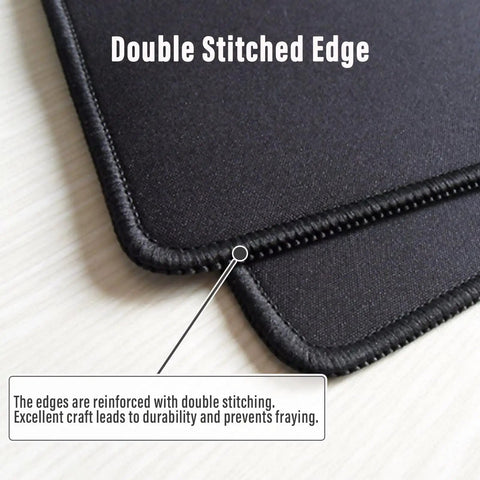 Close-up of Extended XL White Gaming Mouse Pad With Stitched Edges, showing the durable double stitched edge detail.