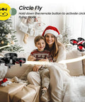 Mini Drone For Kids And Beginners Indoor RC Nano Quadcopter With Auto Hovering near a family by a Christmas tree