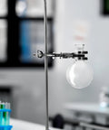 Heavy Duty Die Cast Lab Clamp With PVC Coated Prongs For Beaker And Flask Holders attached to lab stand with flask