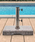 Beefy Granite Patio Umbrella Base Free Standing Stone Stand In Weather Resistant Grey by a poolside deck