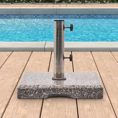 Beefy Granite Patio Umbrella Base Free Standing Stone Stand In Weather Resistant Grey by a poolside deck
