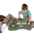 Children playing with Monster City Extreme Wheels Race Track Table For Kids, Portable Two Sided Play Table, green cityscape surface