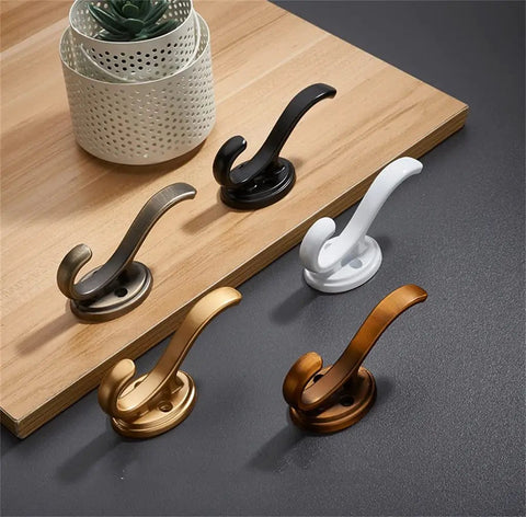 Rock Solid Heavy Duty Wall Mounted Coat Hook For Doors And Walls, Thick Metal Alloy Frame, Zero Tools Required Setup, Super Strong Weight Holders, Fade Resistant Gray Coating, Ultimate Everyday Closet Hanging Organizer displayed in various colors.