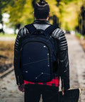 Person wearing Galaxy Themed Backpack With Large Capacity For Everyday Use Unisex Durable Polyester Daypack Featuring Space Graphic