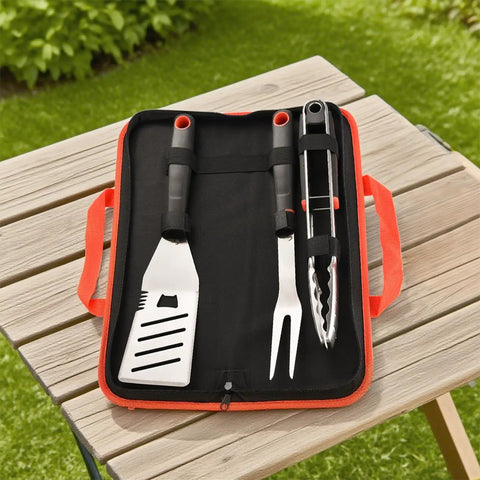 Heavy Duty 4 Piece Barbecue Tools Set With Stainless Steel Spatula Fork And Tongs Plus Free Portable Storage Bag displayed outdoors