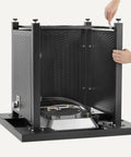 Assembly of the base of the Outdoor Fire Table With 50,000 BTU Square Fire Pit, Black Finish, showing inside framework.