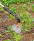 Close-up of 6-Piece Agricultural Spray Nozzle Set For Electric Farm Sprayer With Windproof Shield High-Precision Drift Guard in use in field.