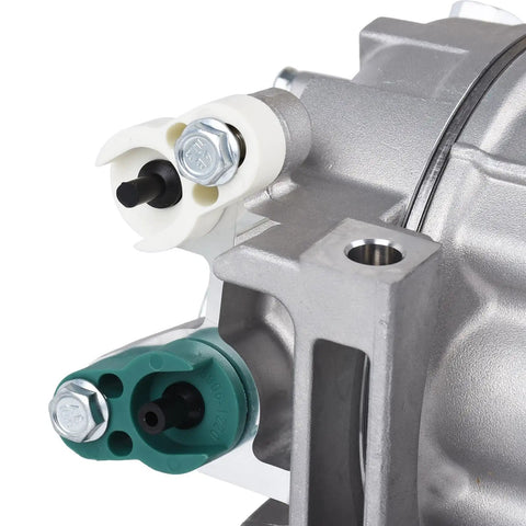 Robust Ac Compressor With Clutch Oem Replacement For Nissan Altima 2.5 L Engine close-up of inlet and outlet connections.