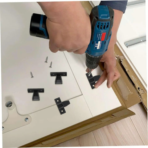 Person installing Straight Fire Quality Push On Fittings 10 Piece Quick Snap Connectors for cabinet with a drill.