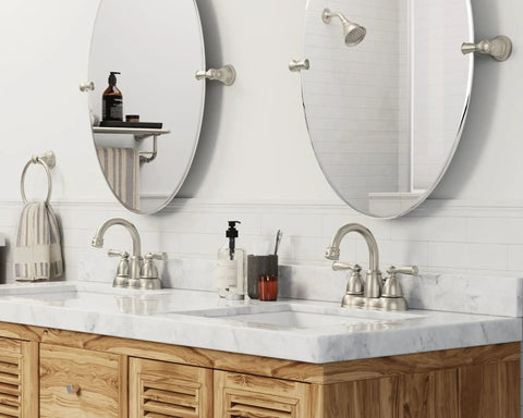Bathroom with Banbury Brushed Nickel Towel Ring, 6 Inch Aluminum Ring with Zinc Post, wall-mounted next to two mirrors.