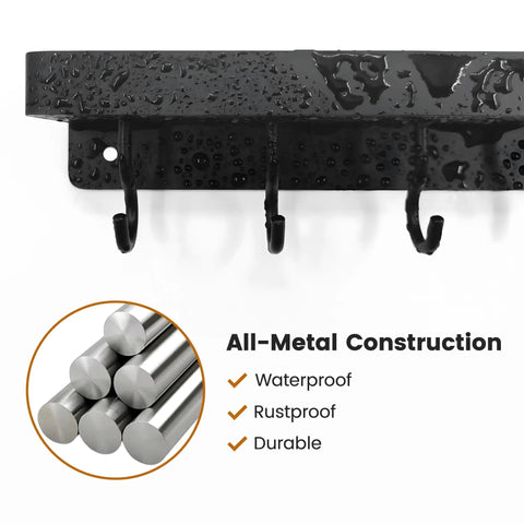 Close-up of Dope Black Stainless Steel Key Holder With Shelf Wall Mount No Drill Self Adhesive Hooks Rack, showing metal construction and hooks.