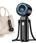 Turbo Handheld Personal Fan With 12,800 RPM Power shown with a bag, displaying LED percentage, foldable strap, and portable design.