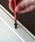 Person using a tool on a black zinc screw from the 1630 Piece Black Zinc Phillips Pan Head Machine Screw Workhorse Assortment Kit.