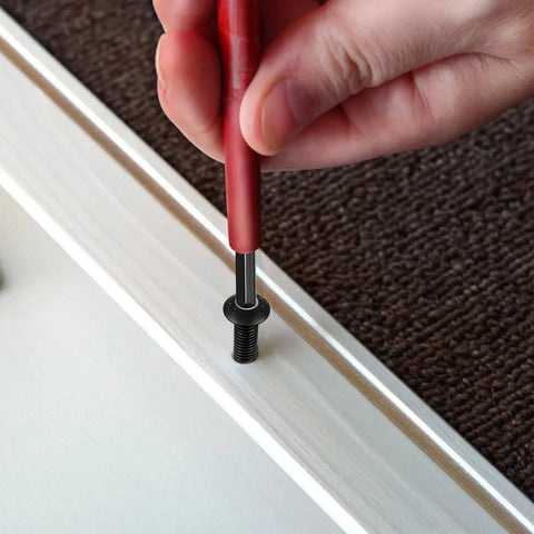 Person using a tool on a black zinc screw from the 1630 Piece Black Zinc Phillips Pan Head Machine Screw Workhorse Assortment Kit.