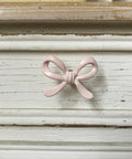 Pink Bow Drawer Pulls And Cabinet Knobs Set, 6 Pack, Solid Metal Handles For Dresser, Vanity, And Kid Friendly Furniture, Adorable Nursery Chic Accent, Easy Swap, Durable And Modern on white dresser