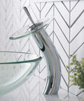 Tall Waterfall Vessel Sink Bathroom Faucet with Glass Disk in Chrome Finish beside vessel sink in modern bathroom.