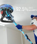 Man using Heavy Duty Drywall Sander With Vacuum Dust Collection Pro Grade Power 900W 7.2A Variable Speed 800 1800 RPM on ceiling